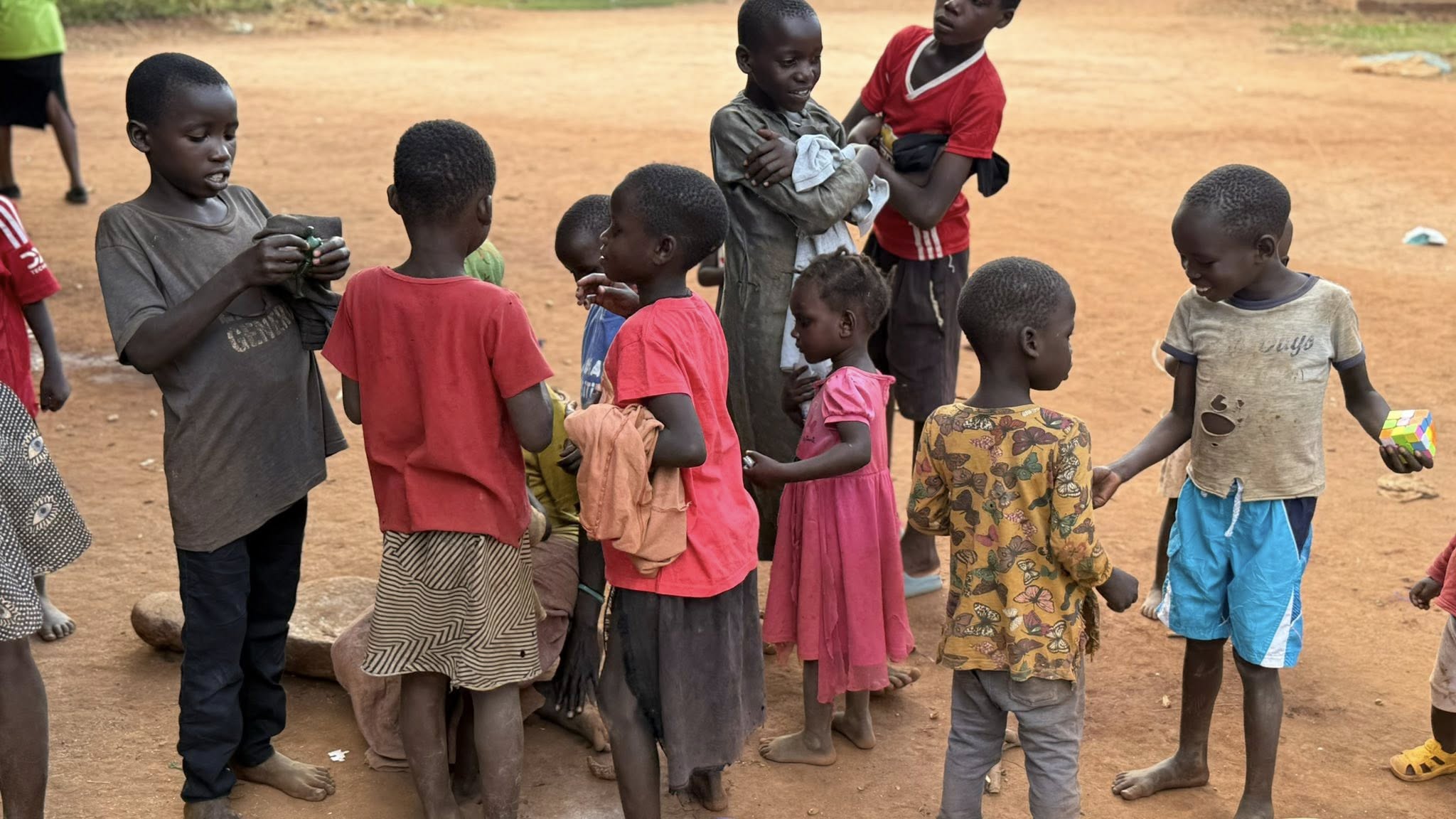 Volunteers helping children in the program